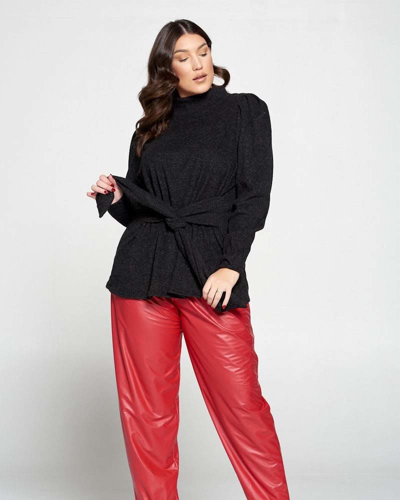 Front of a model wearing a size 2X Anna Waist Tie Sweater in Black Hacci Rib by L I V D. | dia_product_style_image_id:241215